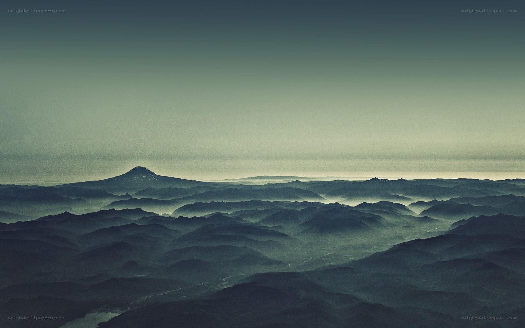 Misty mountain ranges at dawn