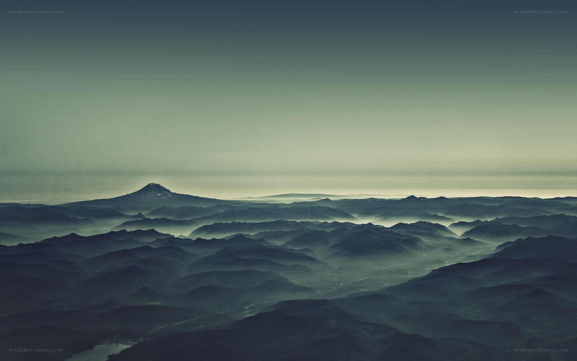 Misty mountain ranges at dawn