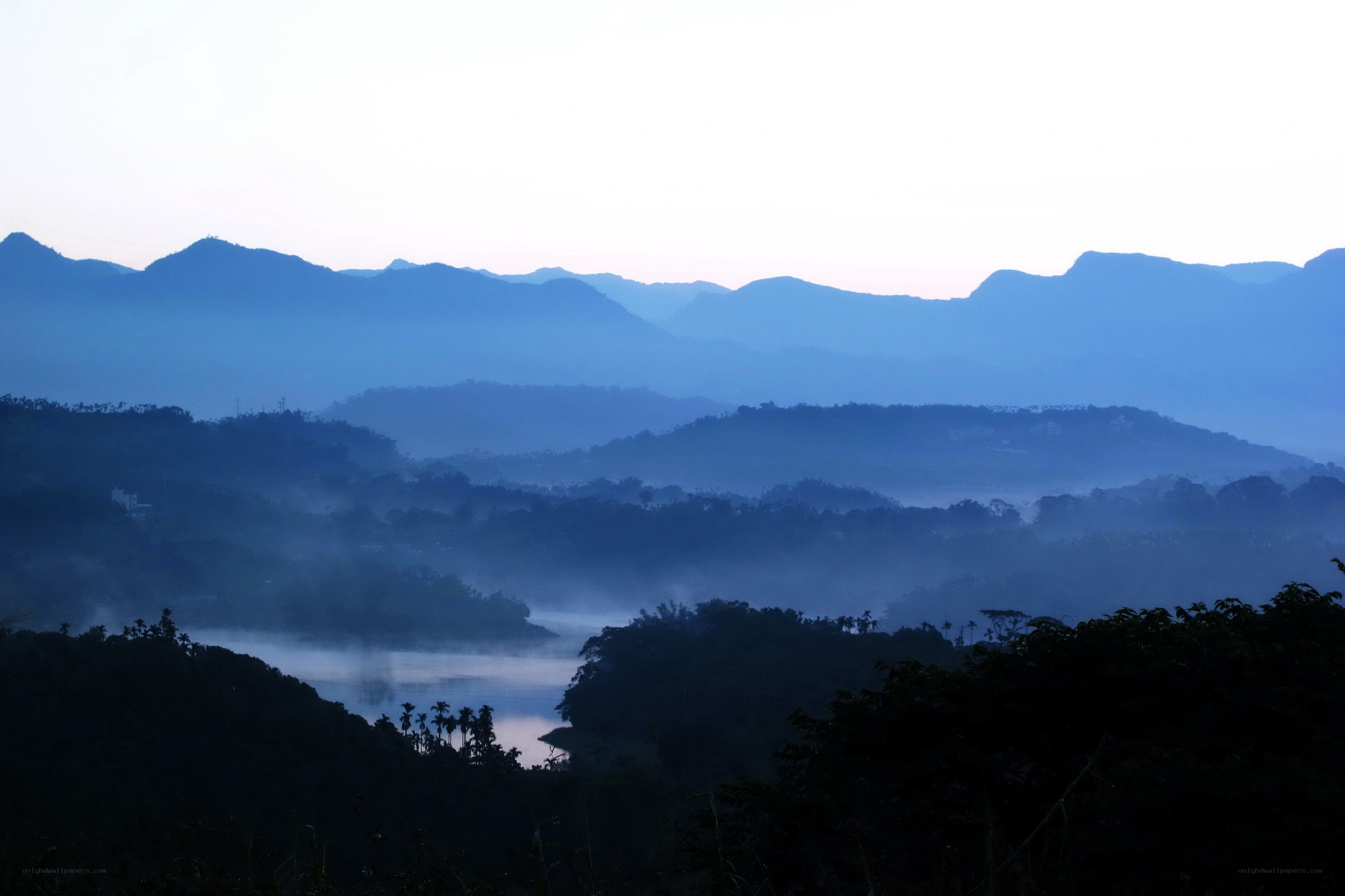 Misty mountain valley at dawn