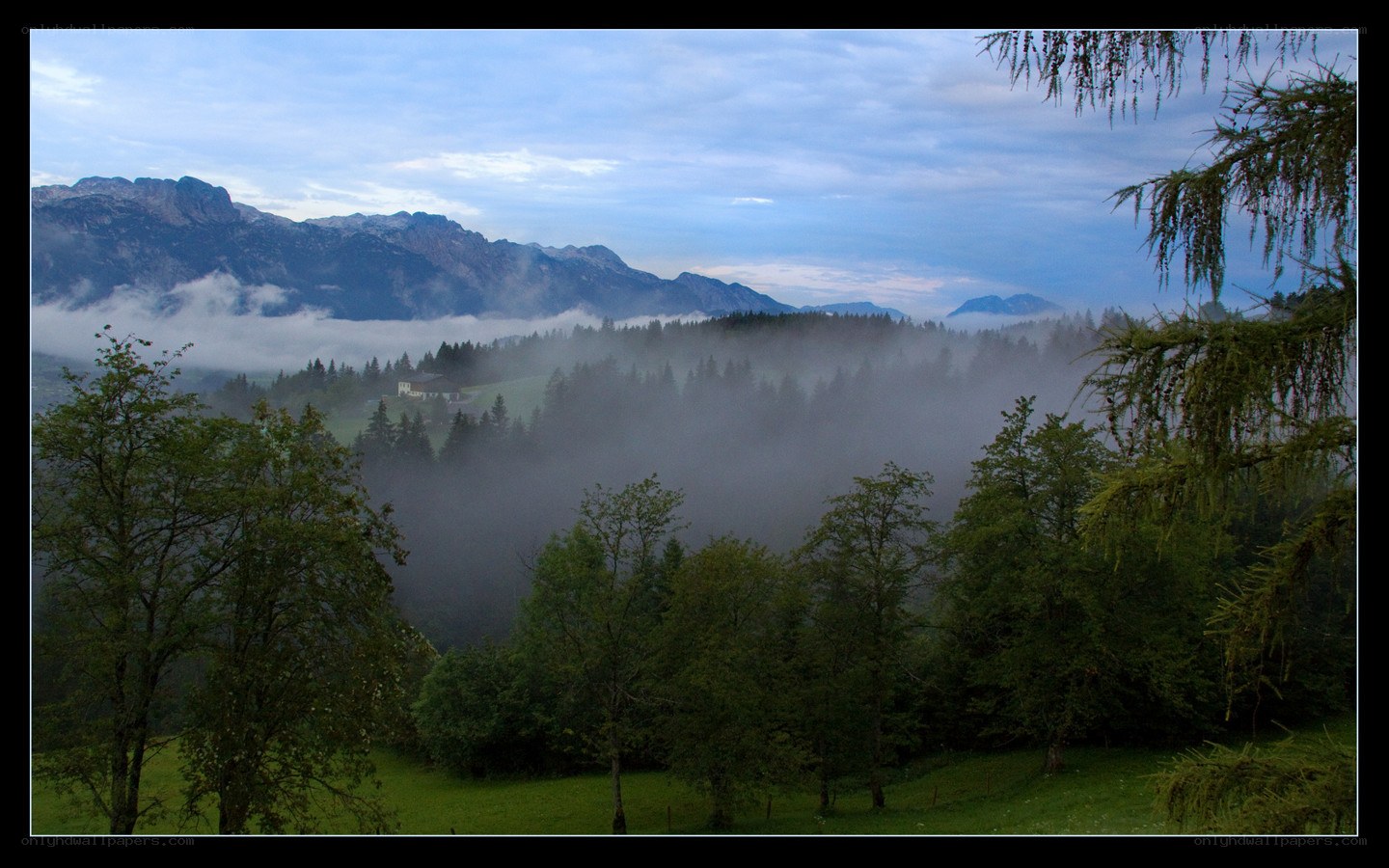Misty mountain valley at dawn