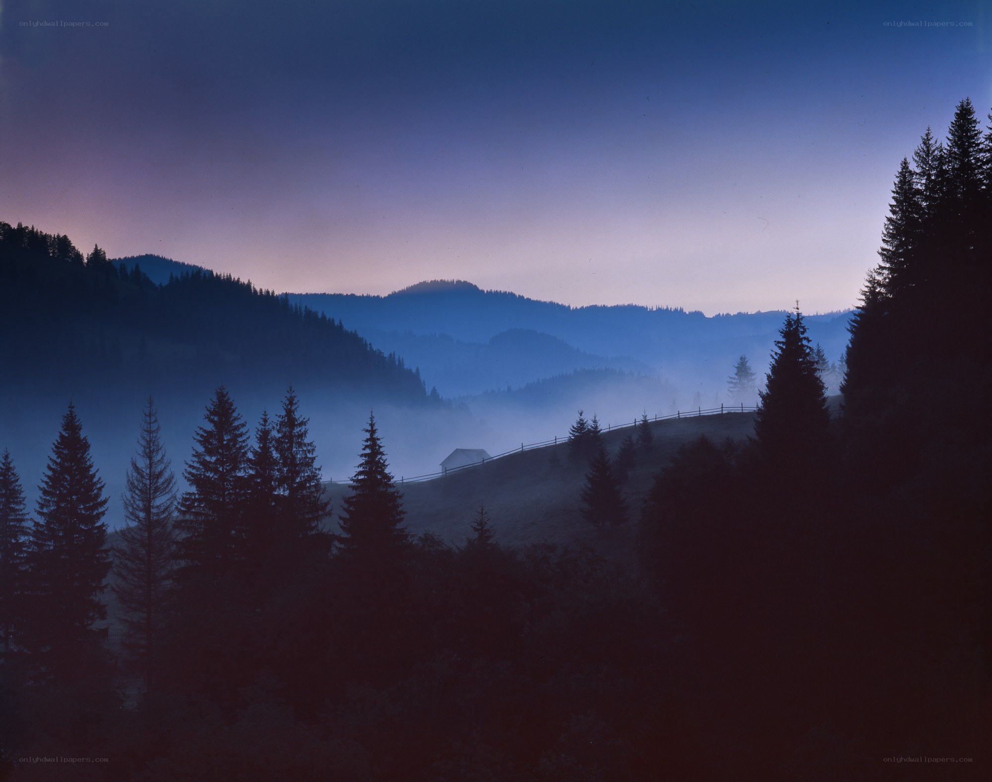 Misty mountain valley at dawn