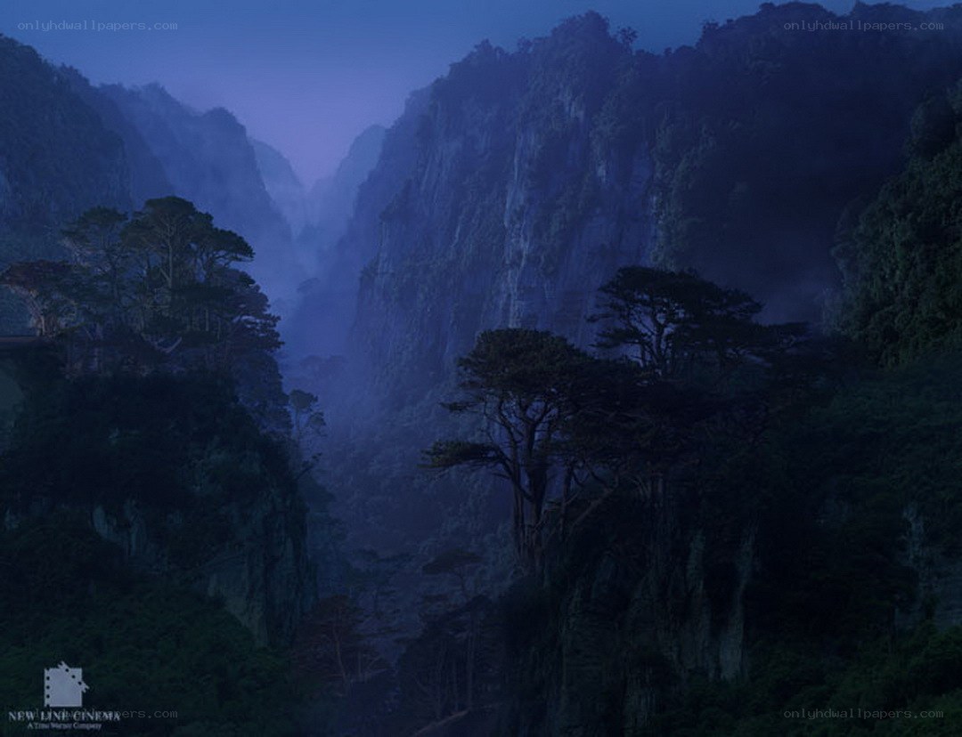 Misty mountain valley at dusk