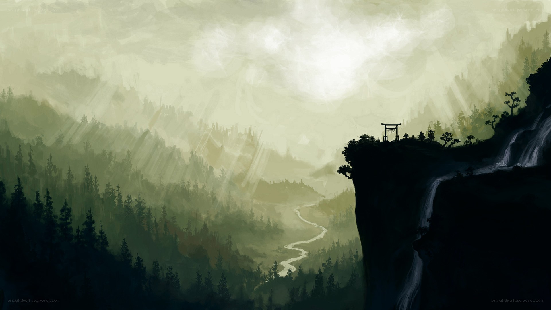 Misty mountain valley with waterfall