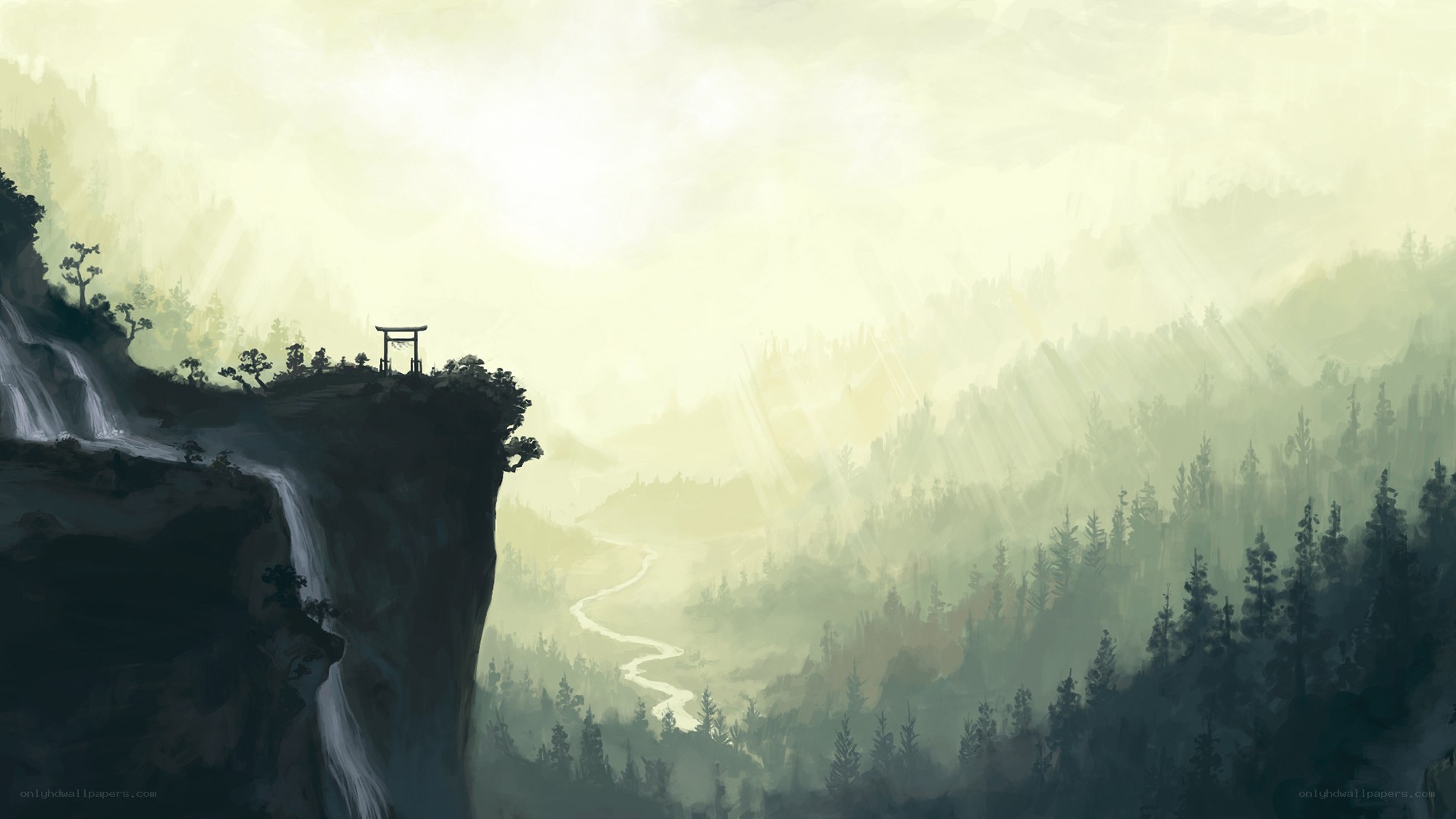 Misty mountain valley with waterfall