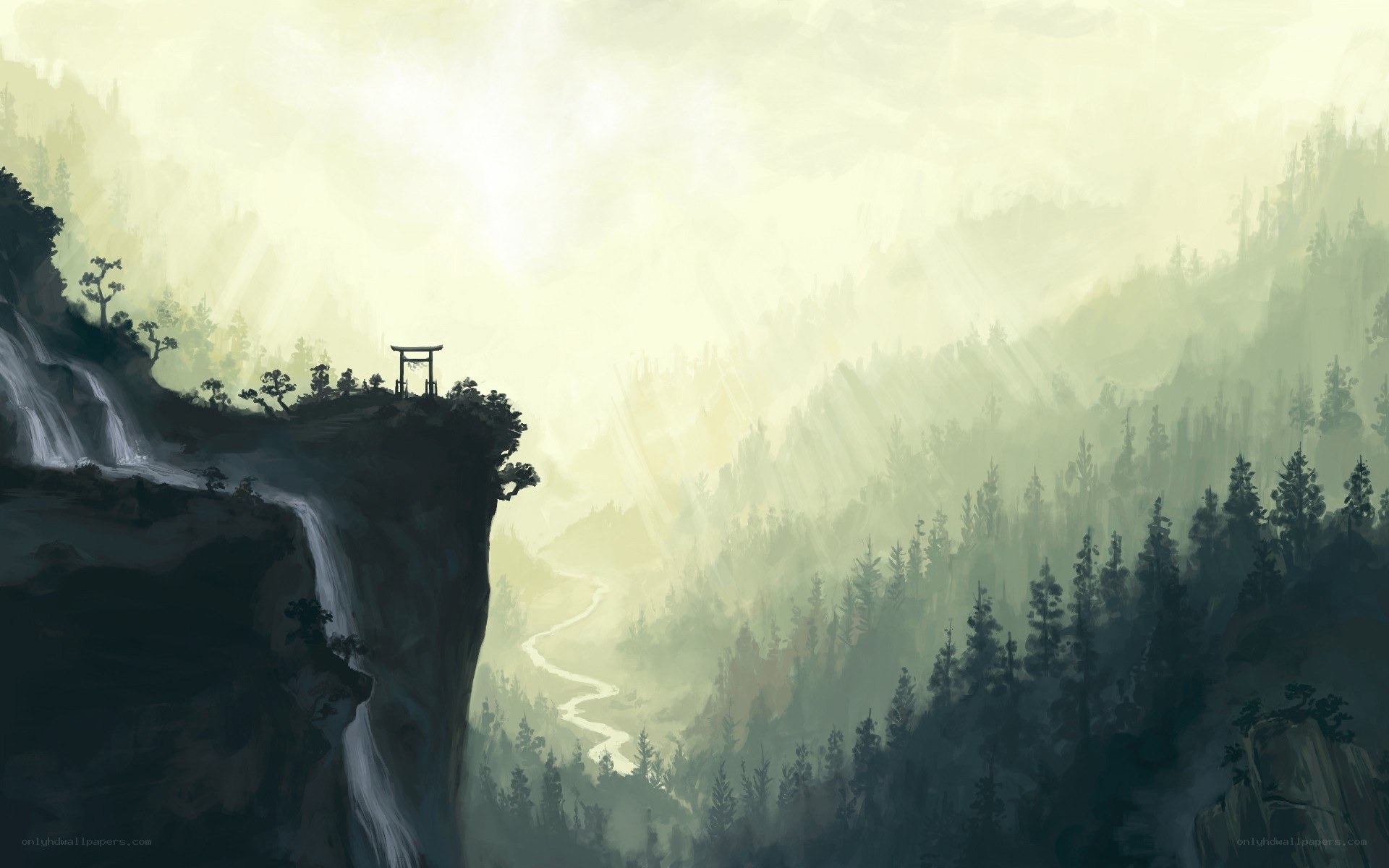 Misty mountain valley with waterfall