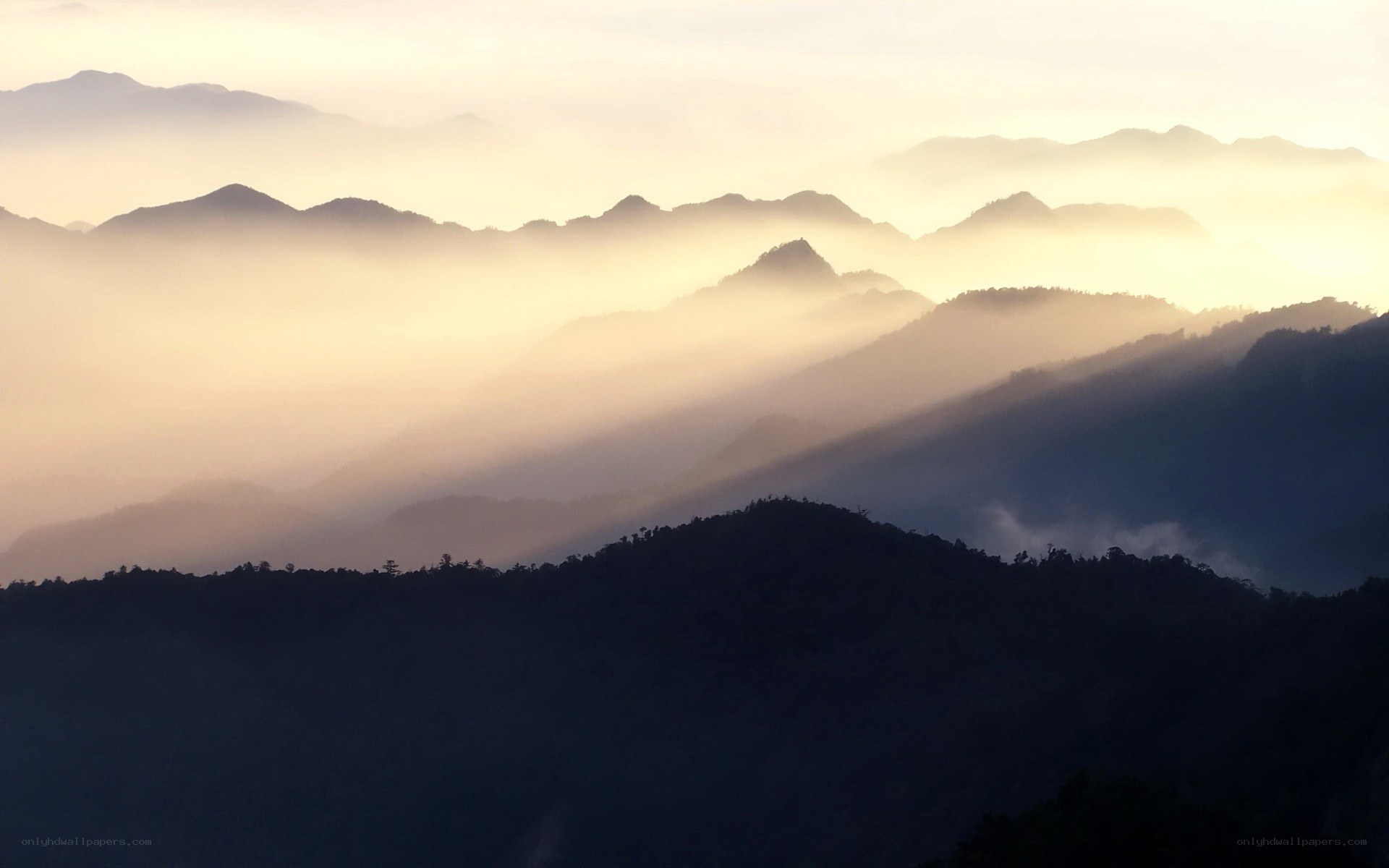 Misty mountains at sunrise