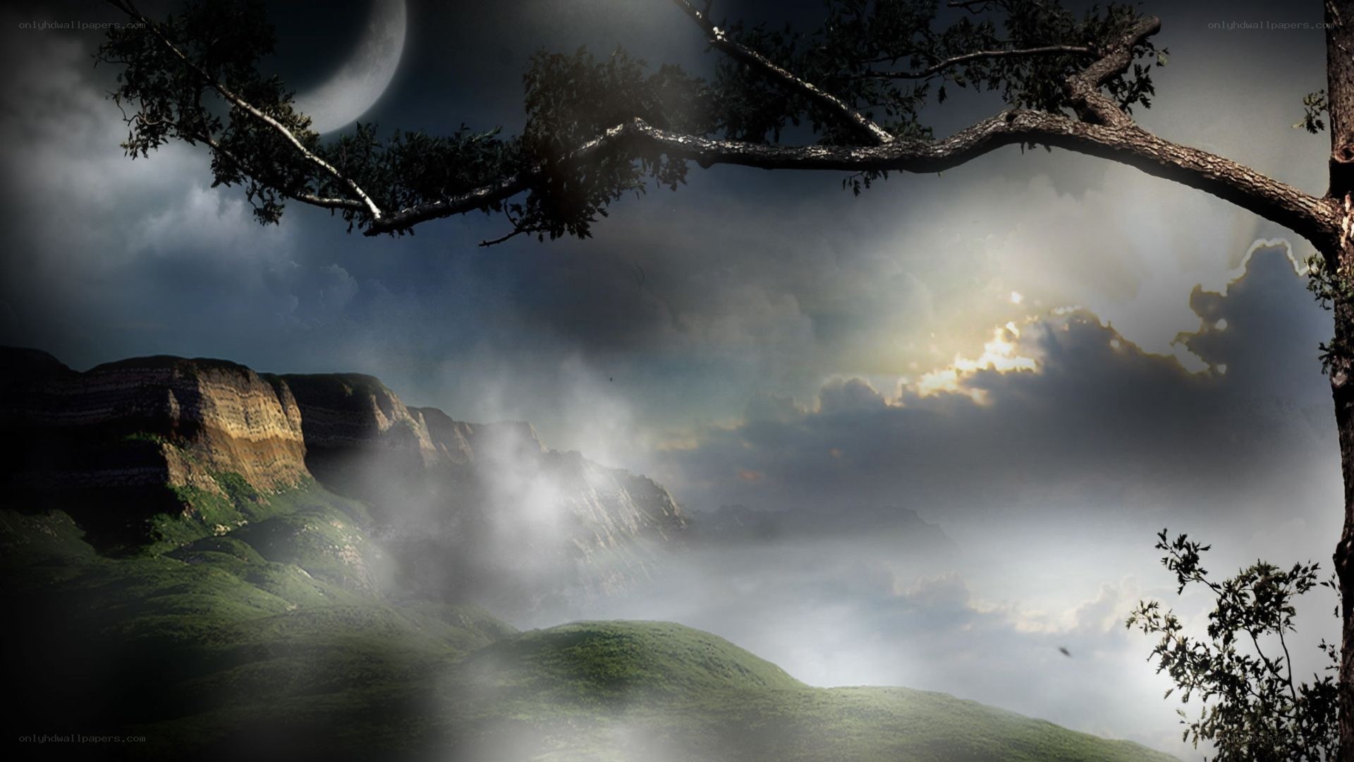 Misty mountains under crescent moon