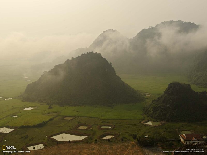 Misty rice fields and karst mountains