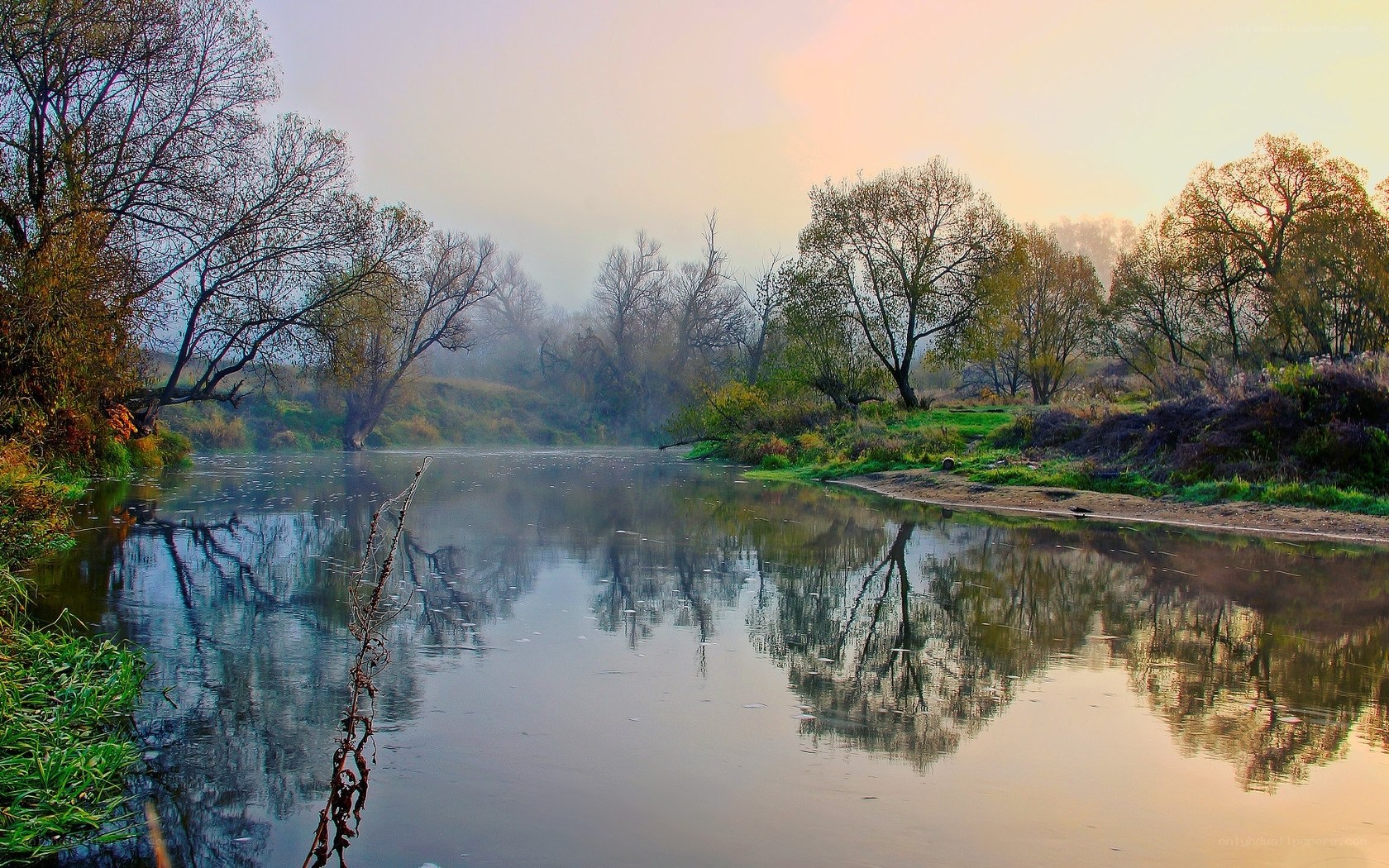 Misty river at dawn