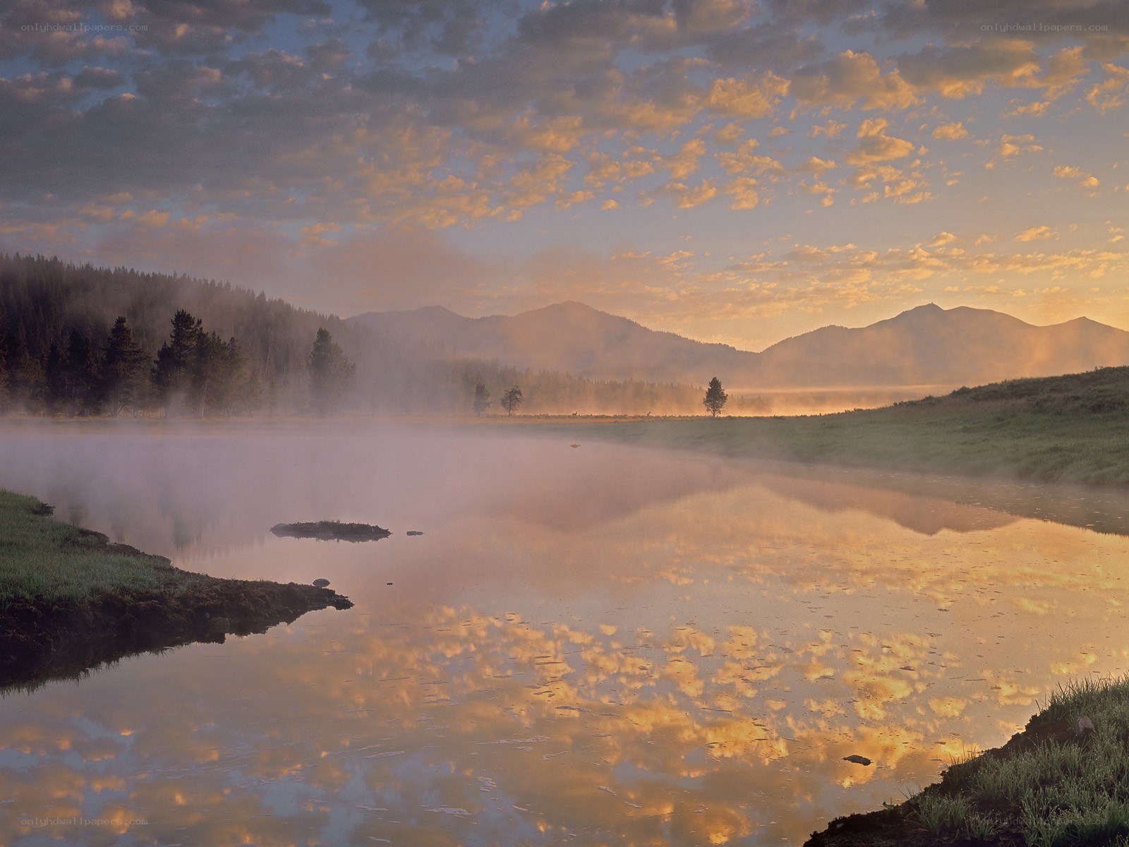 Misty river at sunrise
