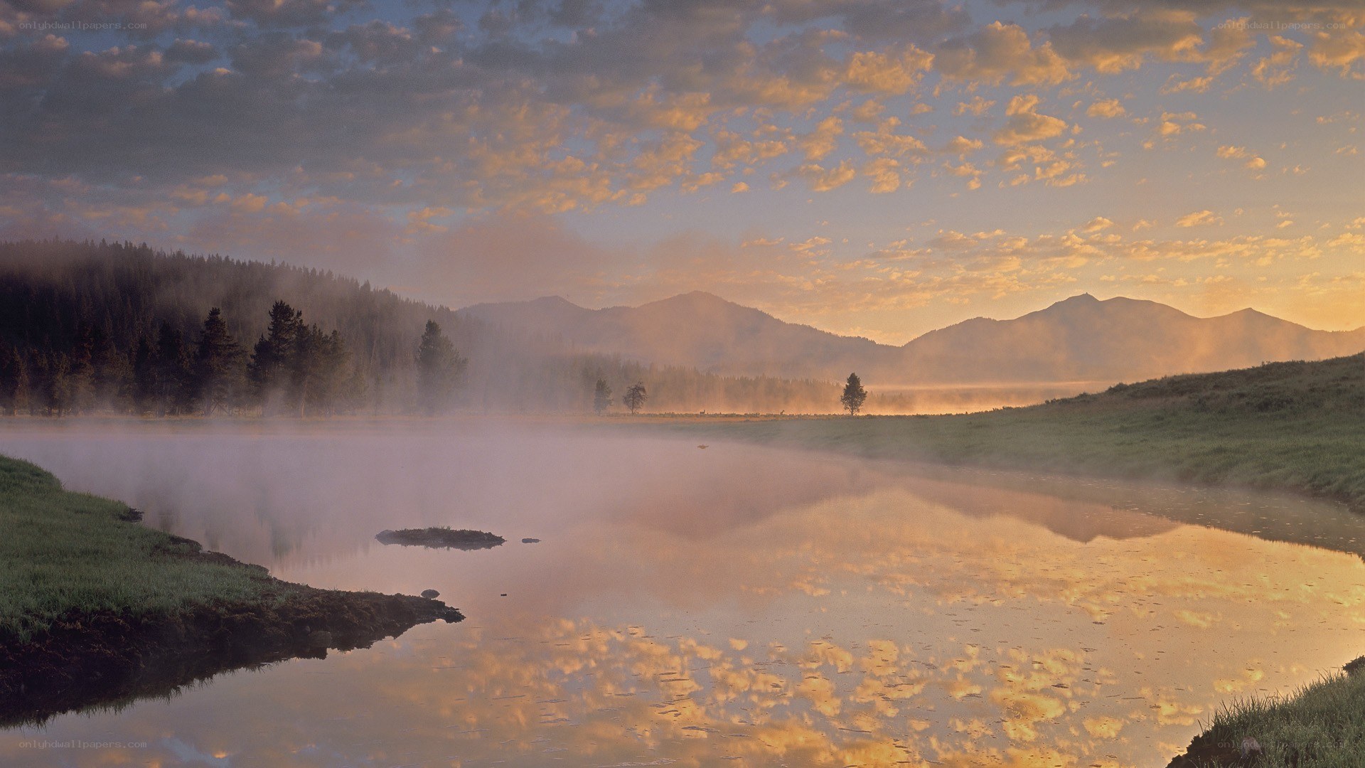 Misty river at sunrise