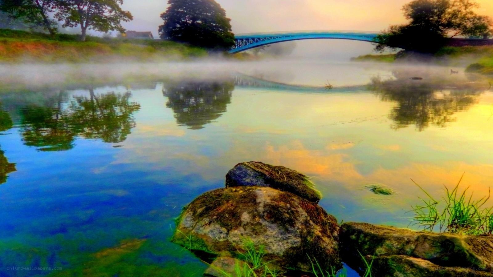 Misty river at sunrise