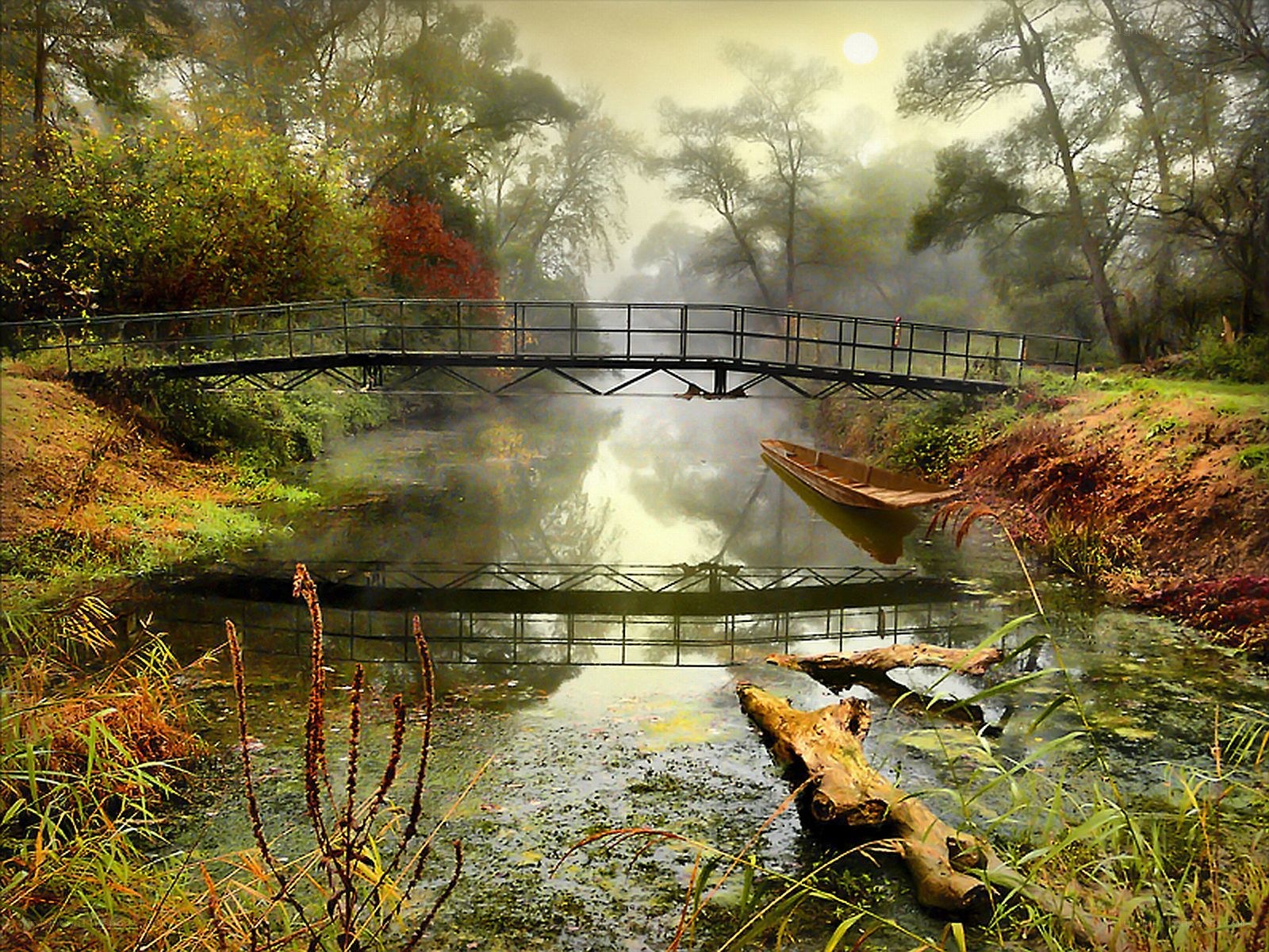 Misty river with bridge