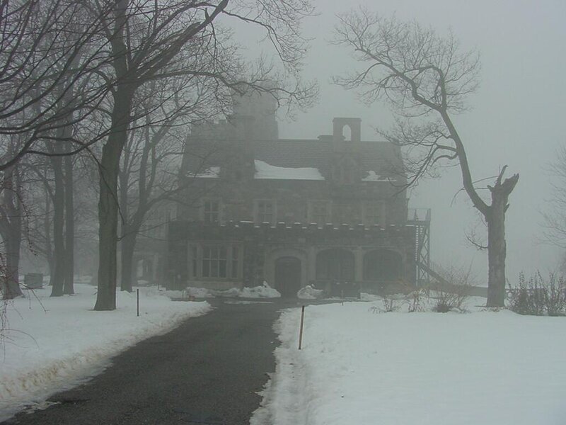 Misty snow-covered mansion