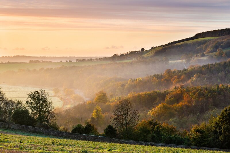 Misty valley at sunrise