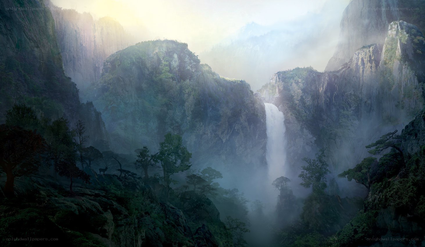 Misty waterfall in a mountain valley