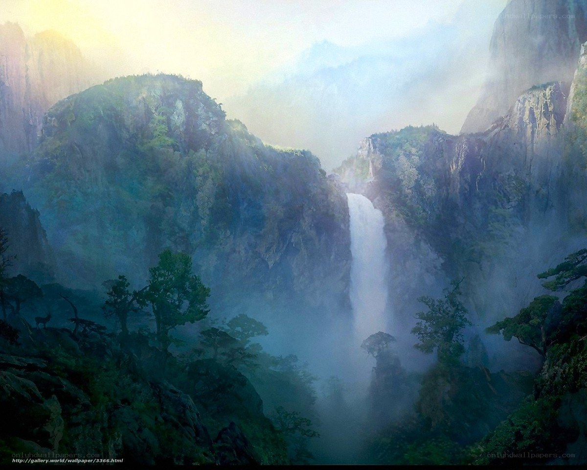 Misty waterfall in mountain canyon