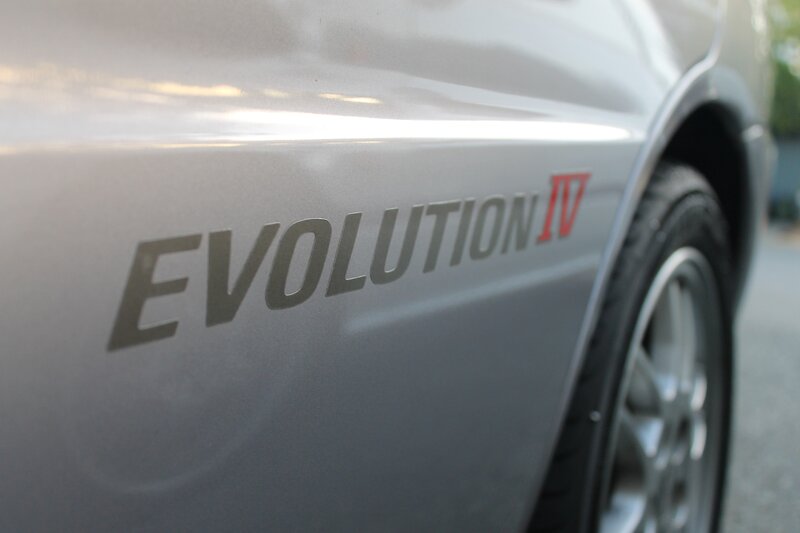 Mitsubishi Evolution IV badge