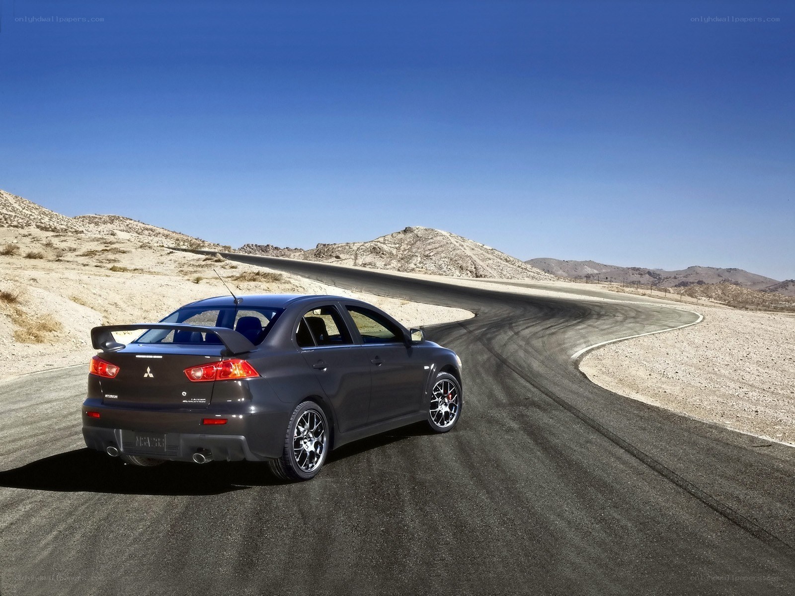 Mitsubishi Lancer Evolution on desert track