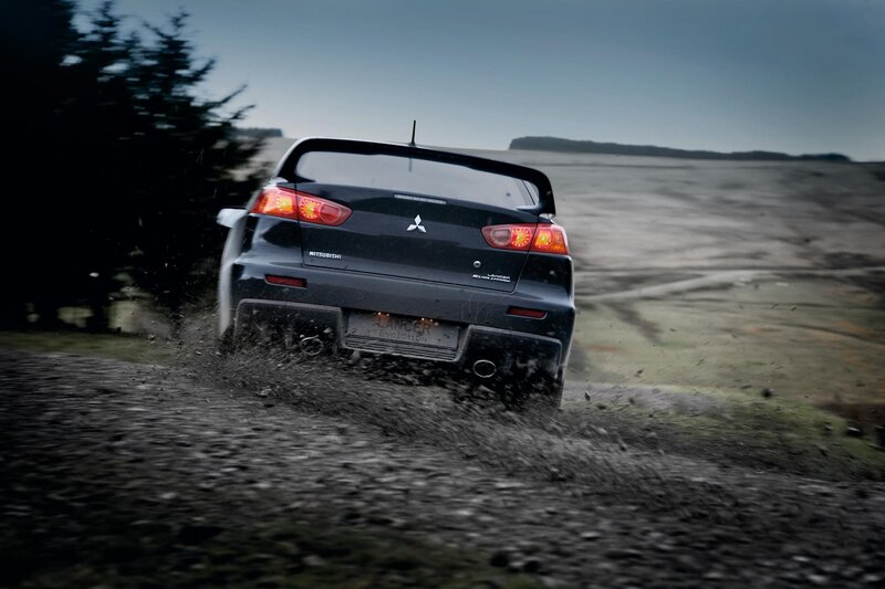 Mitsubishi Lancer Evolution on dirt road