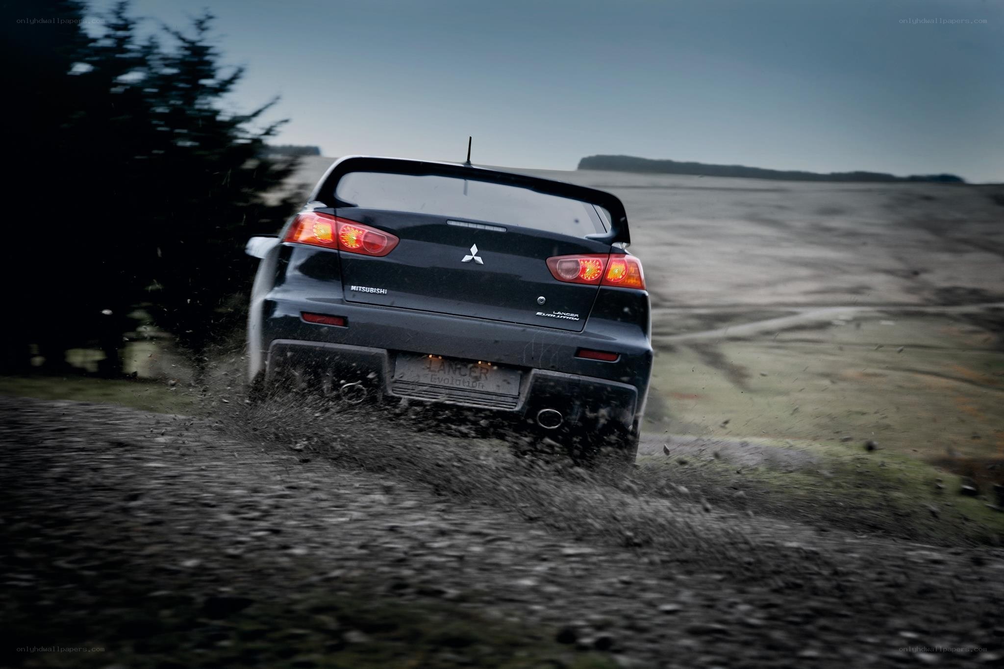Mitsubishi Lancer Evolution on dirt road
