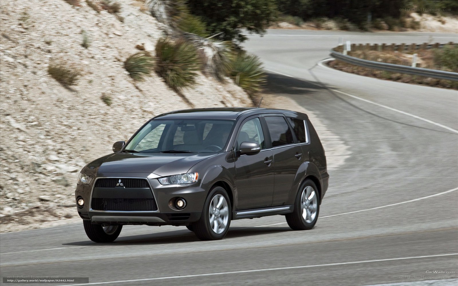 Mitsubishi Outlander on winding road