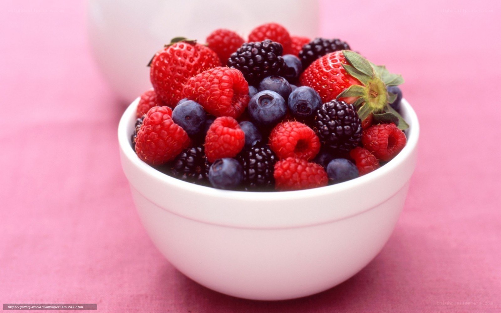 mixed berries in a white bowl
