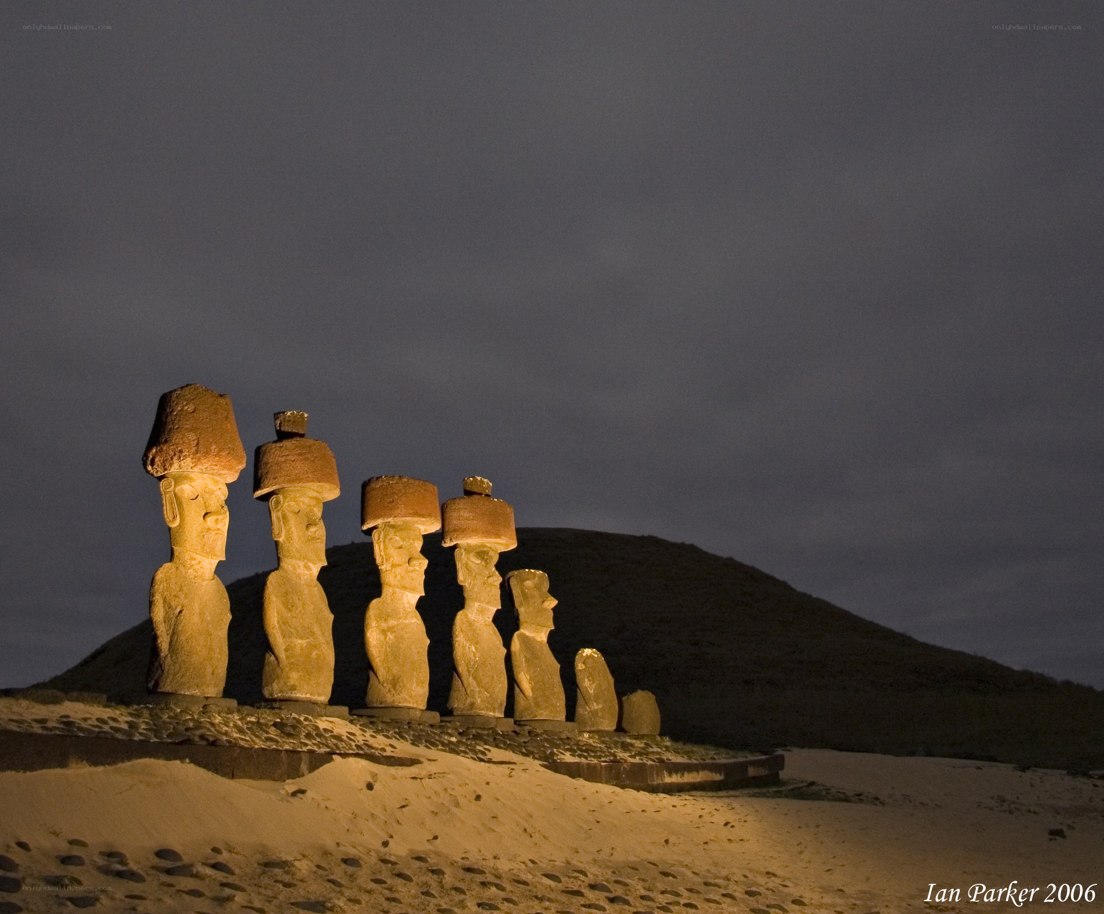 Moai statues at night