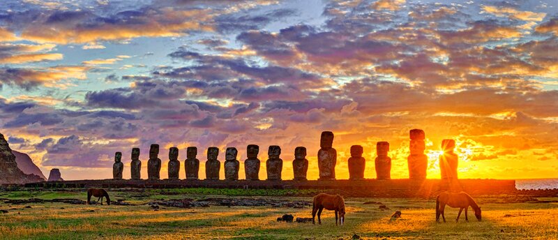Moai Statues at Sunset — Orange, Dramatic