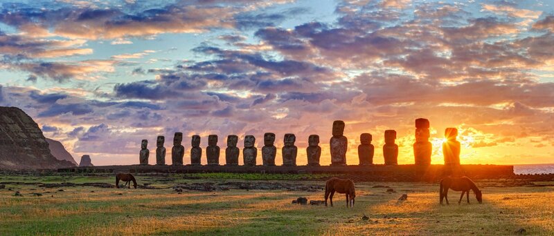 Moai Statues at Sunset — Orange, Serene