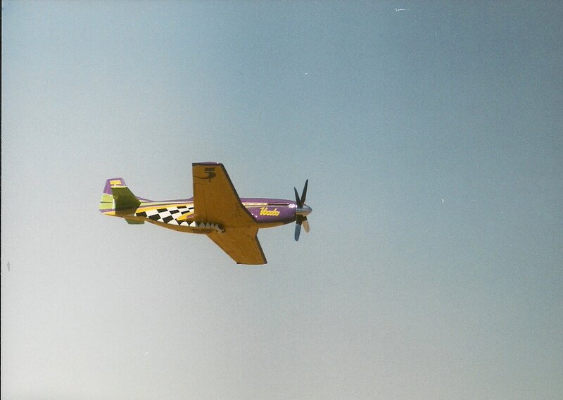 Model Airplane in Flight — Purple