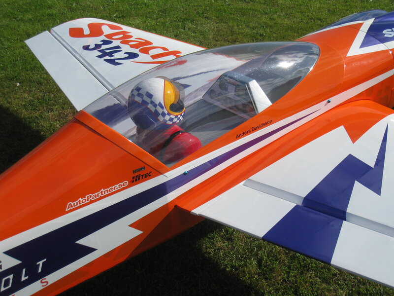 Model Airplane on Grass — Orange