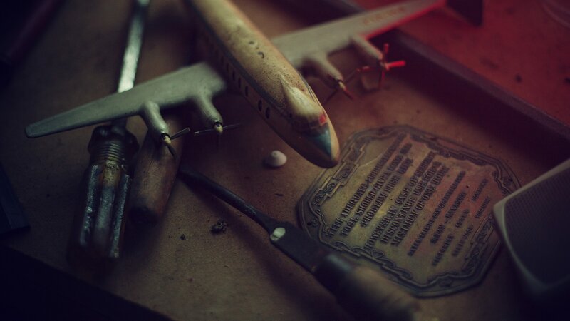Model Airplane on Workbench