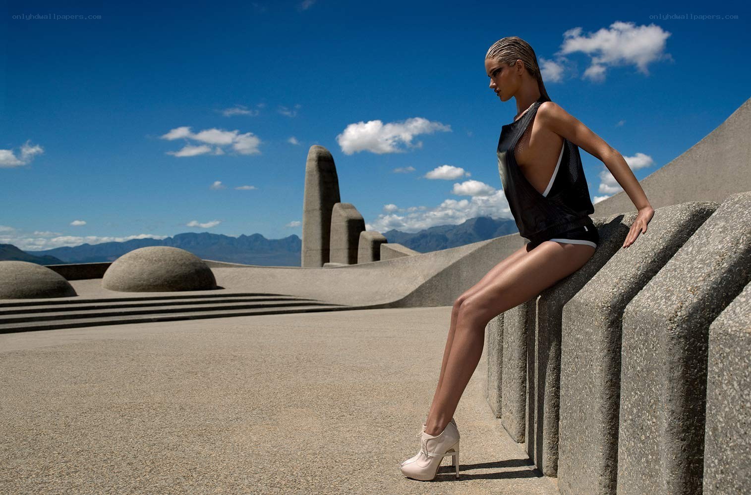 Model at modern sculpture site