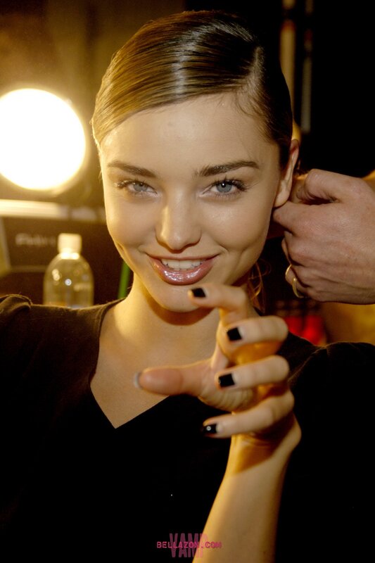 model backstage at fashion show