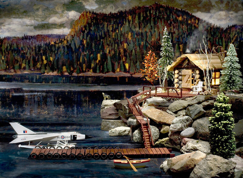 Model cabin by a lake