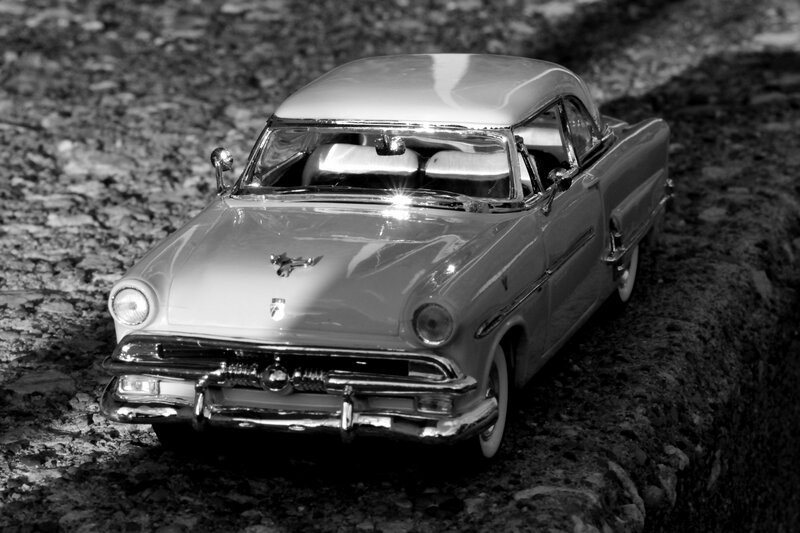Model Car on Gravel — Black, Dramatic