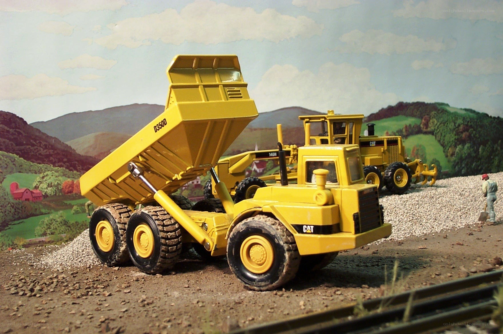Model construction vehicles at work