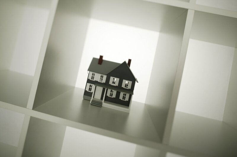 model house in white shelf