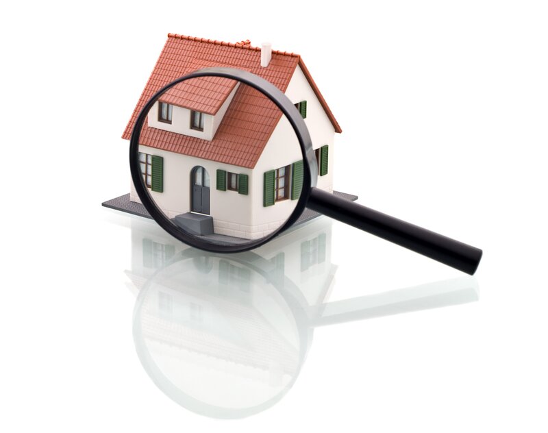 Model House with Magnifying Glass