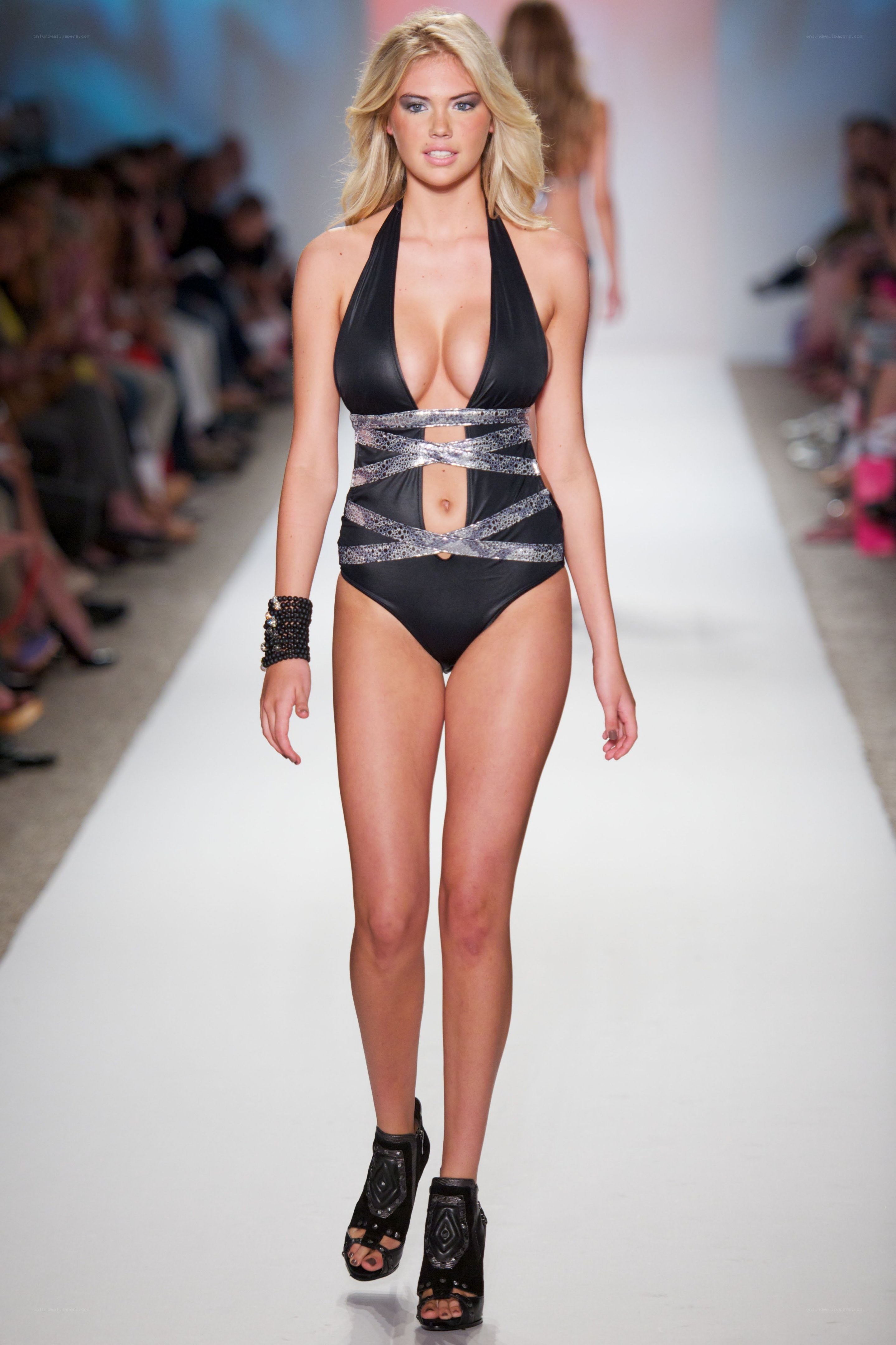 model in black swimsuit