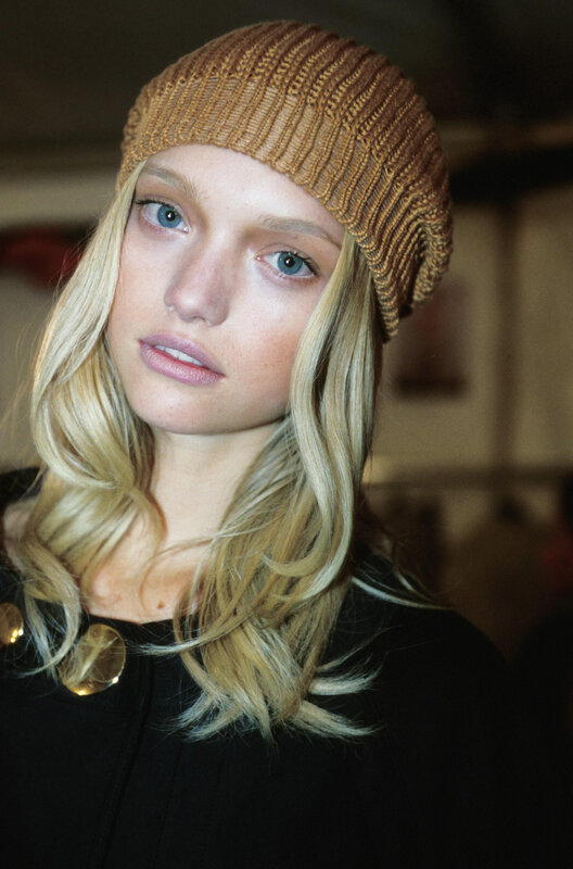 model in brown beanie