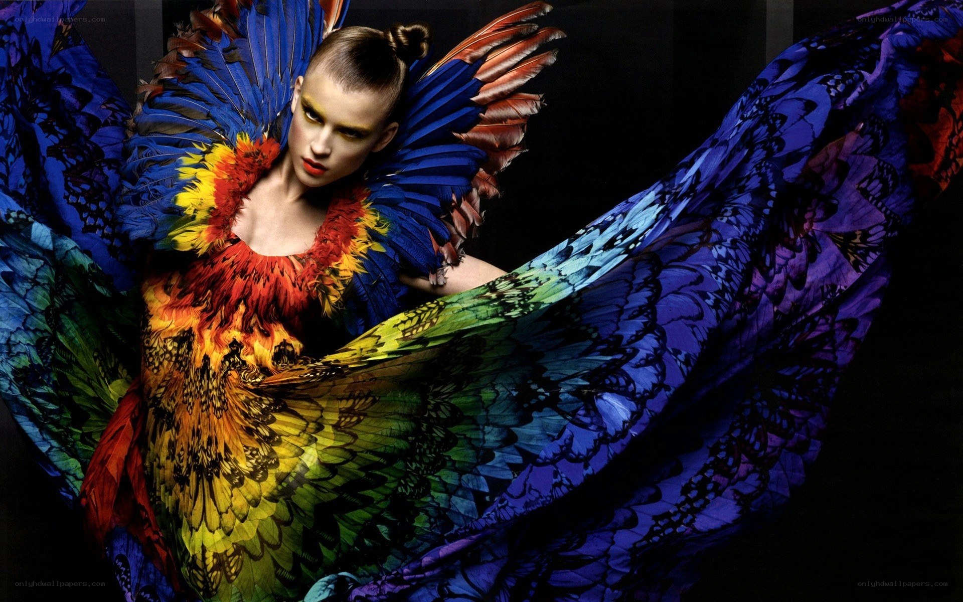 model in colorful feather costume