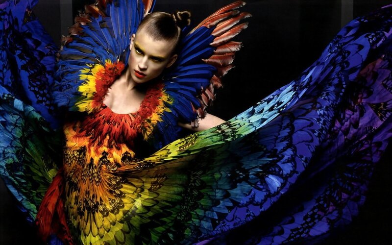 model in colorful feather costume