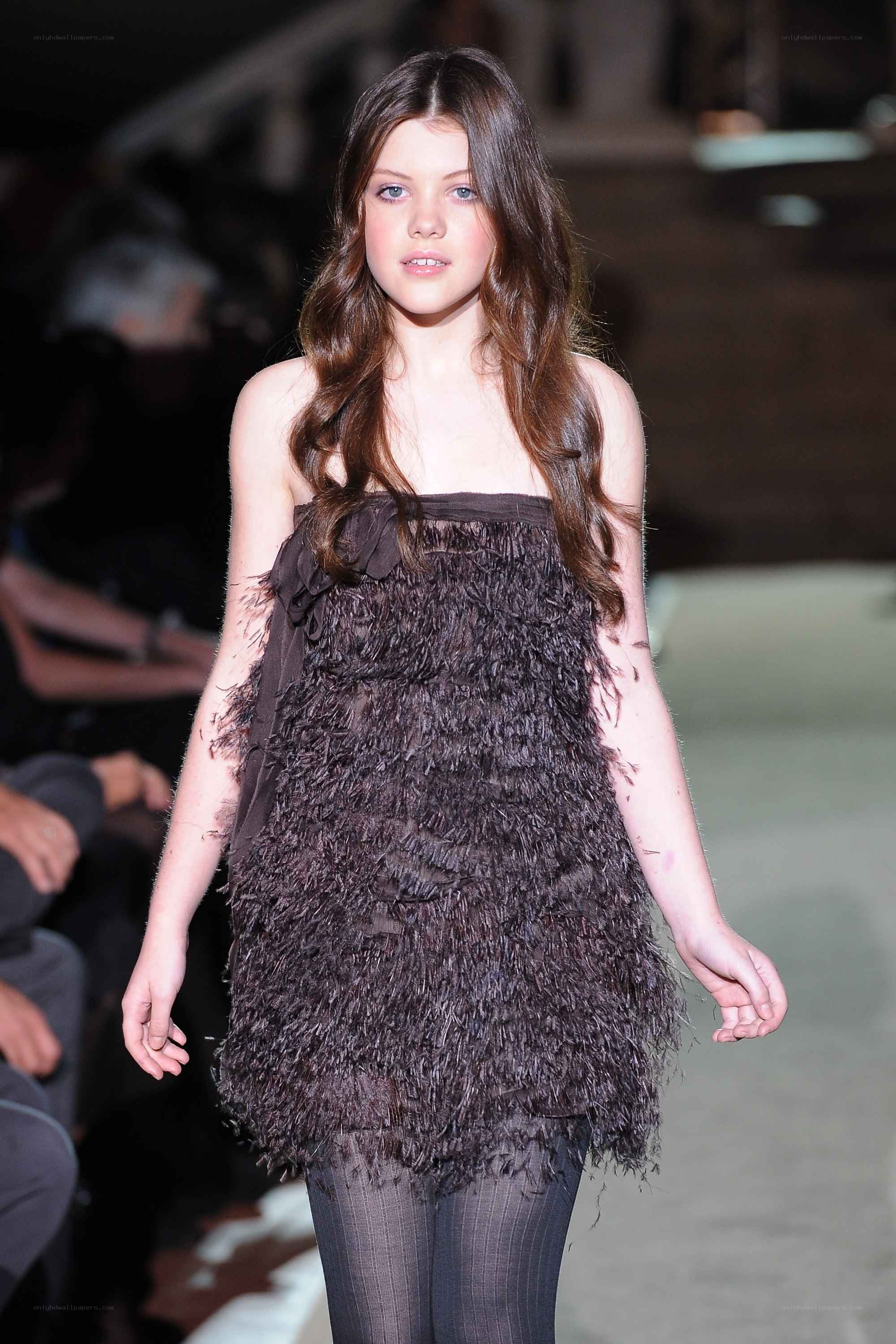 model in feathered dress