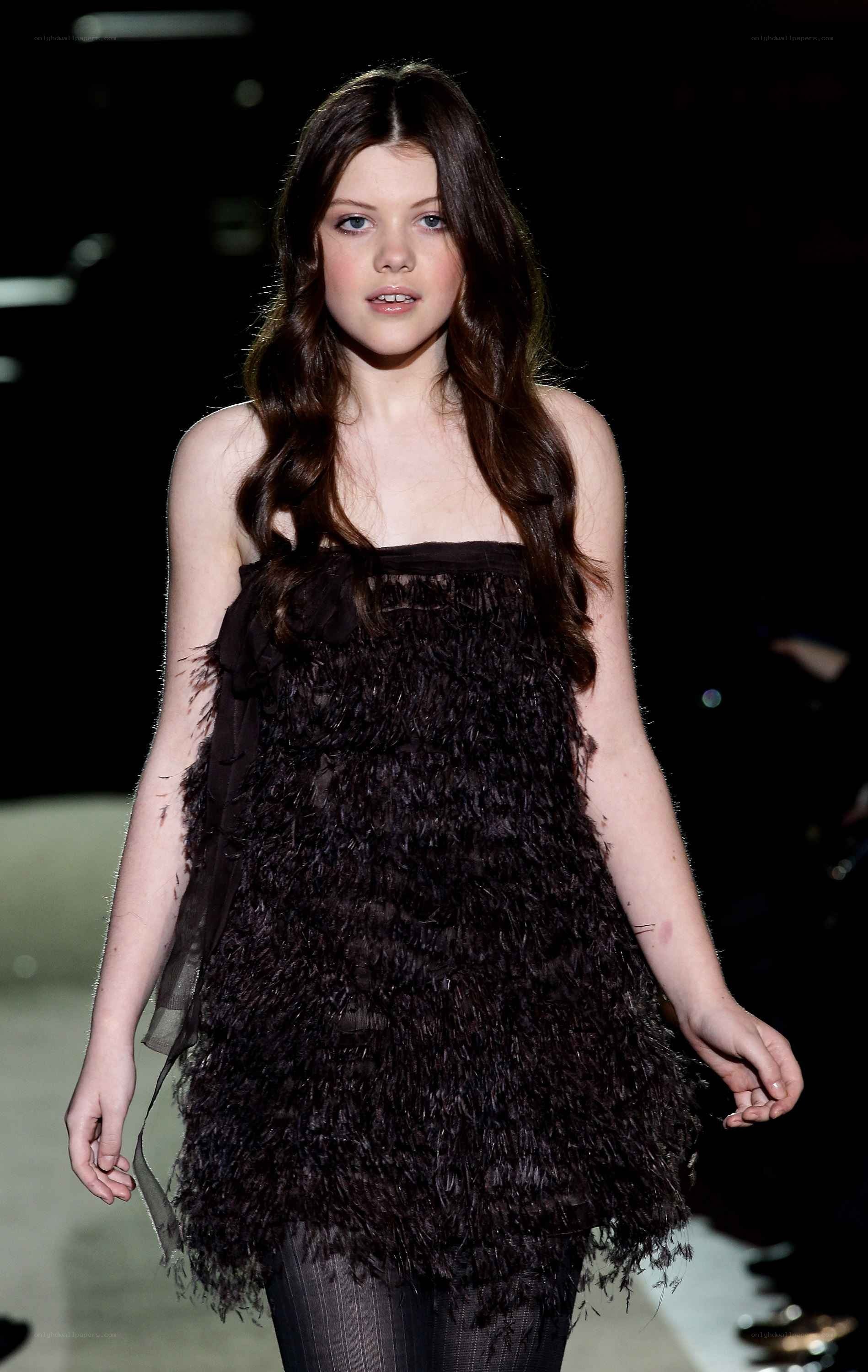 model in feathered dress