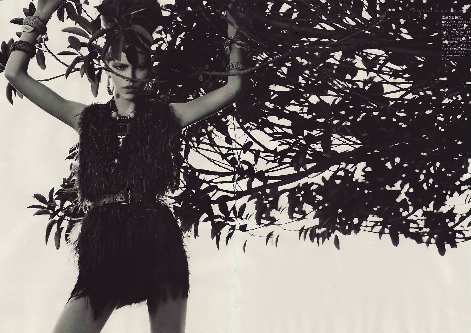 model in feathered outfit