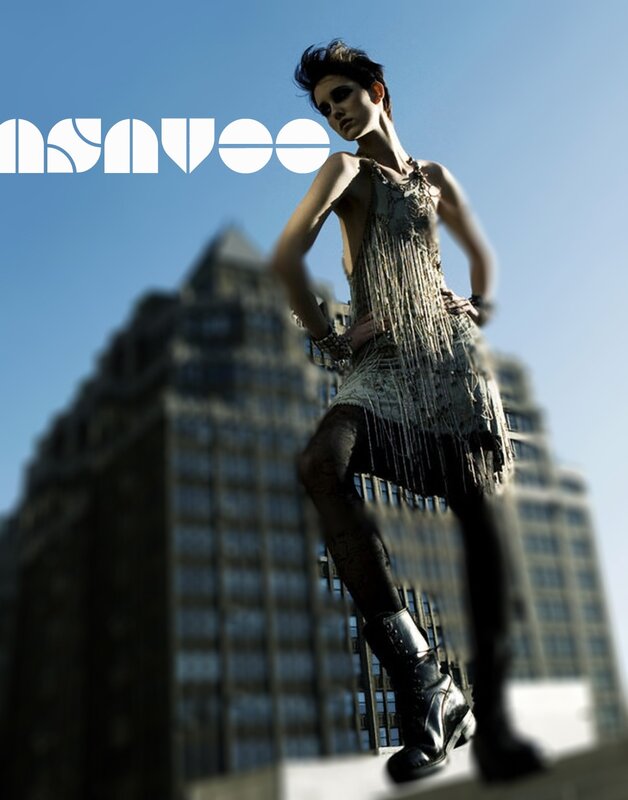 model in fringed dress on rooftop