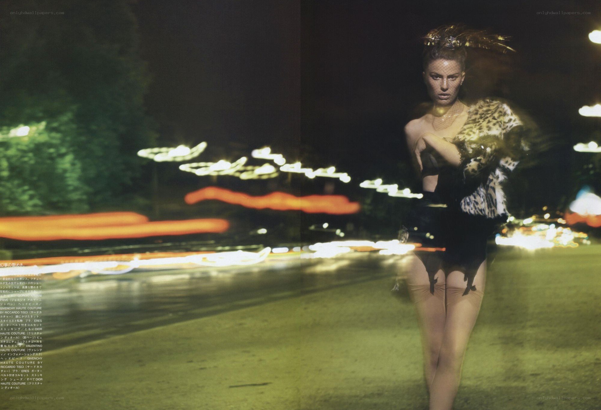 Model in leopard print at night