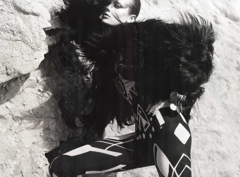 model in patterned outfit